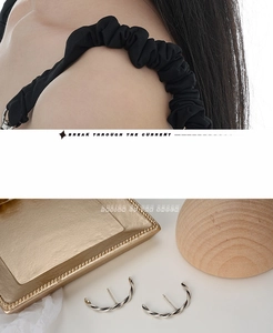 Detailed view of S925 sterling silver twisted rope earrings with a retro textured finish