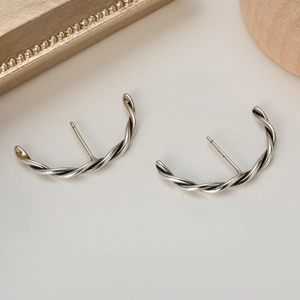 Vintage S925 sterling silver twist stud earrings with oxidized finish and geometric design