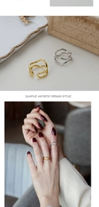 Detail of S925 sterling silver minimalist double wave rings in gold and silver finish