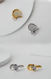 Close-up of S925 sterling silver ear clips with pear-shaped cubic zirconia stones