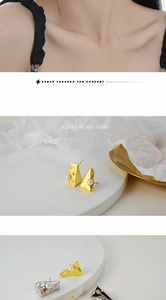 Detail of creative cheese shaped pearl earrings in gold and silver finish