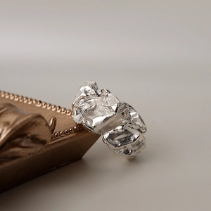 Irregular 925 sterling silver ring with unique crinkle texture and metallic finish