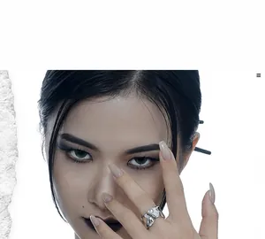 Detail of S925 sterling silver ring with irregular liquid metal texture on finger