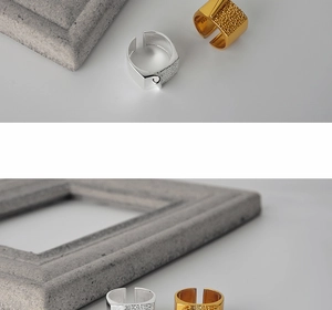 Close-up of S925 sterling silver ring featuring a textured frosted surface and smooth finish