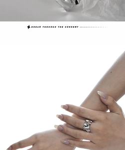 Detailed view of S925 sterling silver irregular molten lava textured open ring