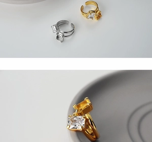 Detailed view of S925 sterling silver rings with rectangular zircon and open design