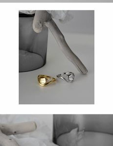 Detail of irregular molten style S925 silver rings in gold and silver finish
