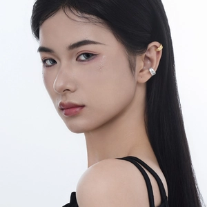 Textured S925 sterling silver ear cuffs in gold and silver finish on female model