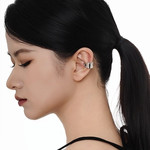 Minimalist S925 sterling silver striped ear cuff with wavy texture on female model
