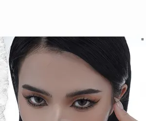 Close-up of grey colored contact lenses with professional European style eye makeup