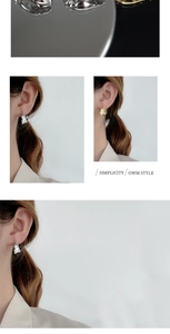 Detail of irregular textured stud earrings in gold and silver showing liquid metal design