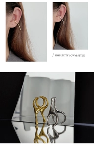 Detailed view of polished gold and silver irregular water drop ear cuffs for women
