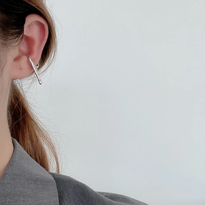 Minimalist S925 sterling silver liquid metal ear cuff with a water drop design