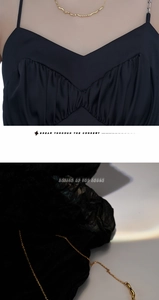 Detailed close-up of golden irregular wavy necklace with sleek metallic texture for women