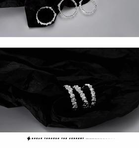 Detail of irregular rock texture on S925 sterling silver rings for women