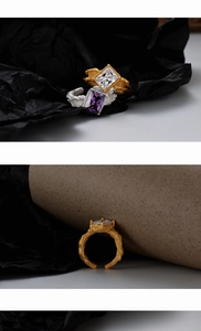 Macro detail of S925 silver rings with lava texture and colorful gemstone inlay