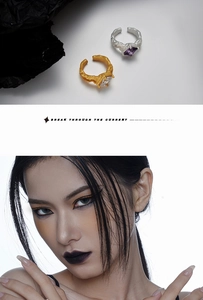 Detail view of S925 silver rings with mineral texture and square gemstones