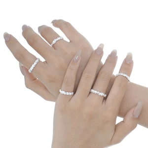 Set of five S925 sterling silver rings with irregular rock texture on fingers