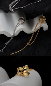 Close-up of S925 silver fringe ear cuff with zircon inlay and elegant long chain detail