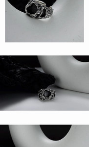 Detailed view of vintage S925 silver ring featuring irregular lava texture and oxidized finish
