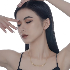 Elegant gold S925 silver necklace with a minimalist wavy irregular bar pendant for women