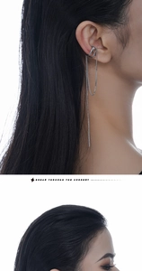 Close-up of S925 sterling silver ear cuff featuring a long tassel chain and zircon inlay