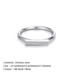 Detail of minimalist stainless steel bar ring with sizing chart and 14K gold color options