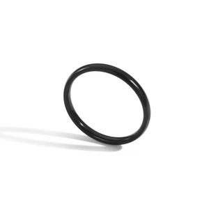 Close-up of a minimalist black stainless steel ring with a polished mirror finish surface