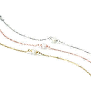 Three minimalist double-layered stainless steel chain bracelets with white pearls