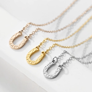 Minimalist U-shaped horseshoe pendant necklaces with hammered texture in three colors