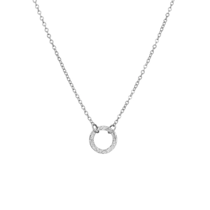 Macro shot of silver geometric round pendant with hammered texture on cable chain