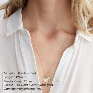 Minimalist stainless steel necklace with hammered round pendant and adjustable chain length