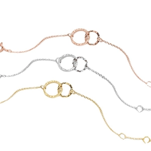 Minimalist double interlocking rings bracelet with hammer texture in three metallic colors
