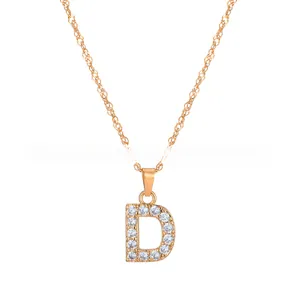 Detailed close-up of rose gold letter D pendant with sparkling pavé cubic zirconia