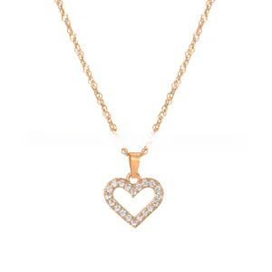 Close-up of rose gold hollow heart pendant necklace with shimmering crystal pavé