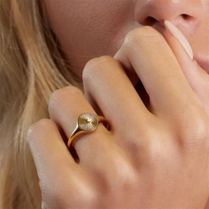 Minimalist gold plated stainless steel signet ring with sunburst radial texture for women