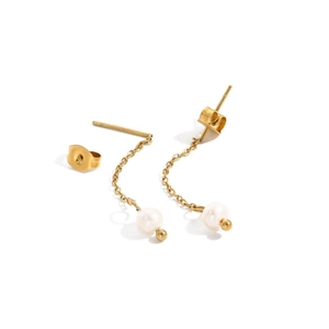 Detail view of long gold chain earrings with white spherical pearls and butterfly backings
