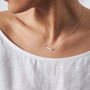 Minimalist double layer 316L stainless steel gold bar necklace for women on model
