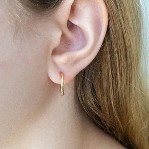 Classic 14K gold plated stainless steel hoop earrings on model for women fashion
