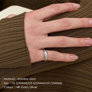 Minimalist stainless steel croissant dome ring with twisted stripe design in silver finish
