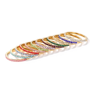 Set of 12 gold stainless steel birthstone rings with colorful cubic zirconia crystals