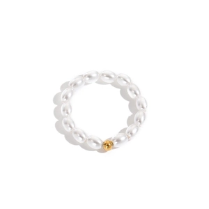 Elegant beaded ring featuring white oval pearls and a single gold bead on white background