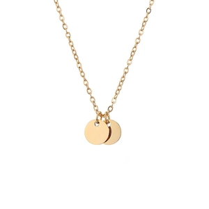 Close-up of polished gold-tone double round disk pendants on a fine link chain necklace