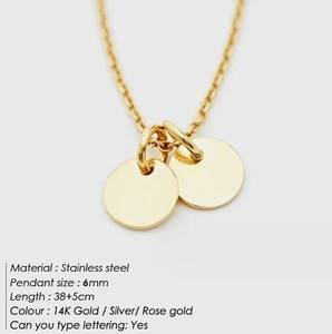 Detailed view of 6mm polished stainless steel circular pendants with 38+5cm chain specs