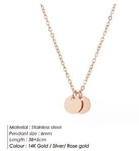 Detailed view of 6mm stainless steel round charms on a 38+5cm rose gold necklace
