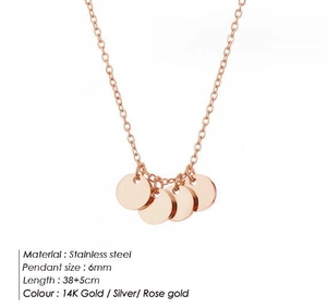 Detail of 6mm polished round charms on a 38+5cm adjustable stainless steel necklace