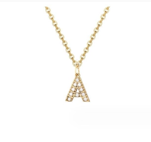 Detail shot of a 14K gold-plated letter A pendant with sparkling white diamonds on a chain