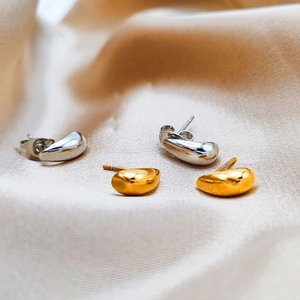 Minimalist titanium steel teardrop stud earrings in gold and silver polished finishes