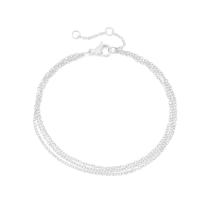 Detailed view of triple-layer stainless steel cable chain bracelet with lobster clasp