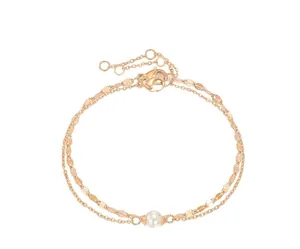 Detail of rose gold double-layered chain bracelet with pearl and lobster clasp